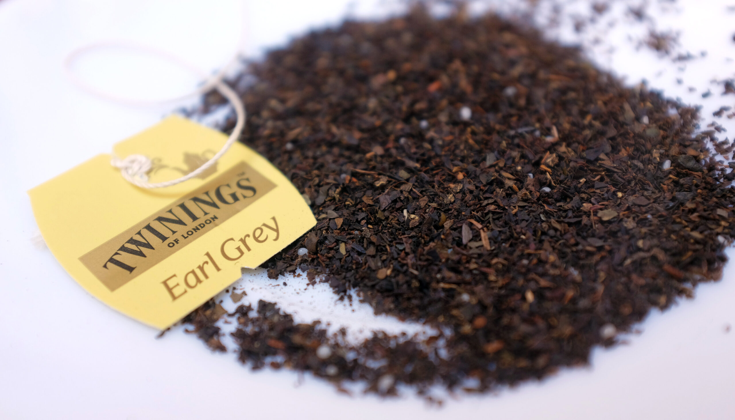 Close-up of the Twinings of London Earl Grey (International Blend) bagged tea leaves.