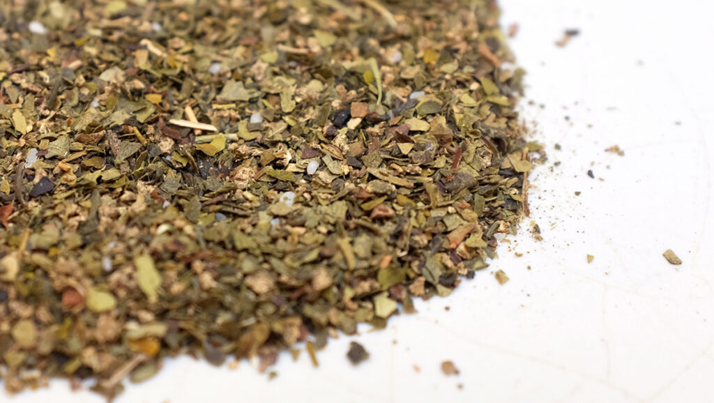 Close-up of Twinings Green Tea Earl Grey teabag blend contents.