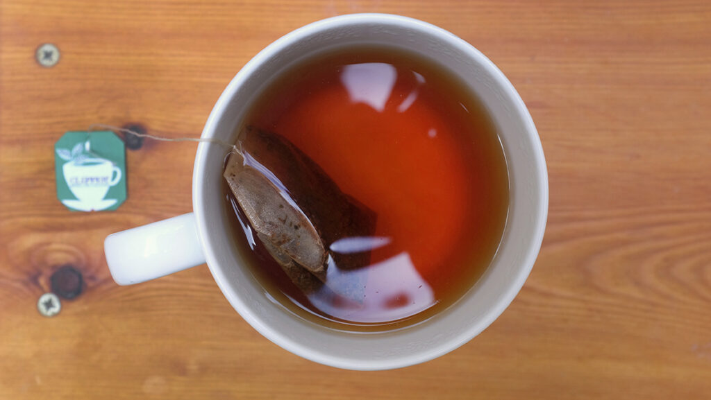 Cup of Clipper Earl Grey tea steeping.